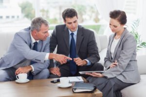 Work team having a meeting together in bright office